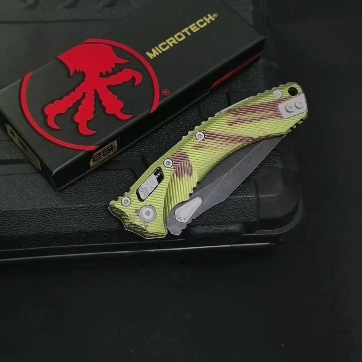9c94c261fdbb7d07cfb6bae1a945b77e.mp4.pdd_.000001.jpeg Microtech Amphibious Resident Evil Edition Folding Knife